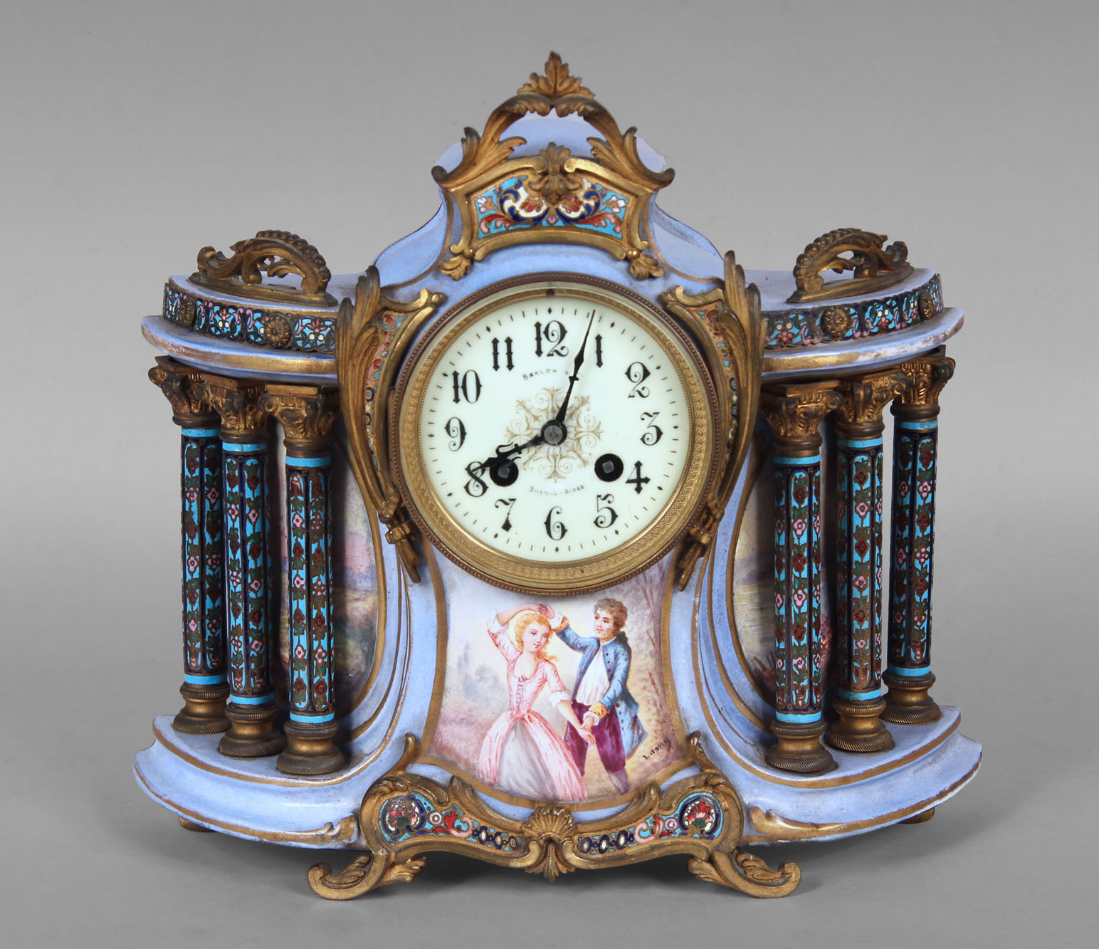  RELOJ CON CAJA DE CERAMICA ESMALTADA.