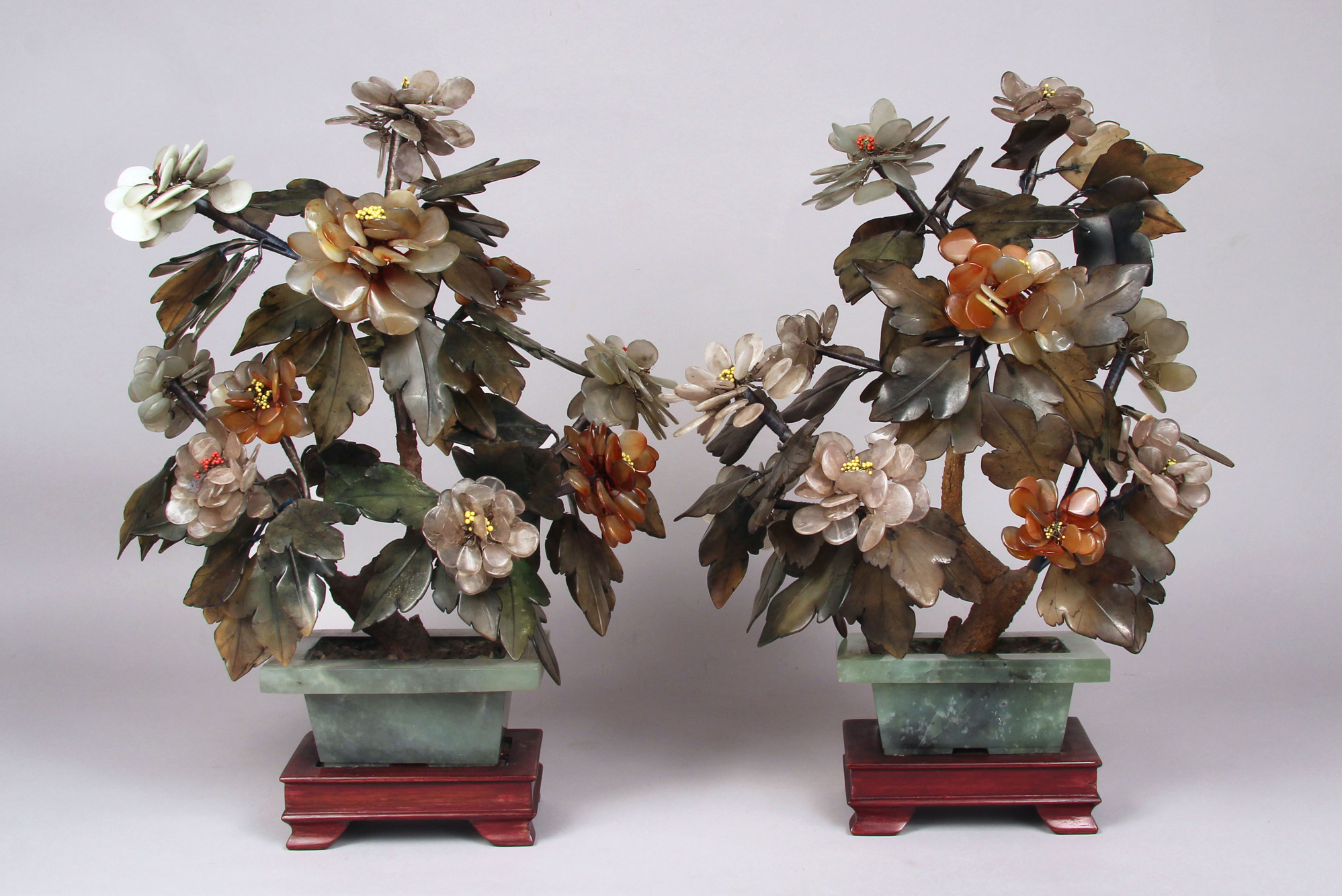 PAR DE MACETAS CHINAS DE PIEDRA DURA PULIDA. PAR DE MACETAS CHINAS DE PIEDRA DURA PULIDA.