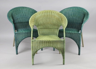 Lote 230: CUATRO SILLONES DE MIMBRE TRENZADO.  CUATRO SILLONES DE MIMBRE TRENZADO. 