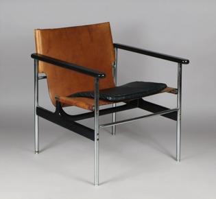 Lote 272: POLTRONA DE CUERO DISEÑO DE CHARLES POLLOCK. POLTRONA DE CUERO DISEÑO DE CHARLES POLLOCK.