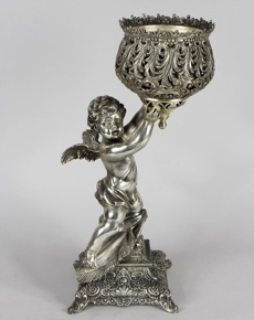 Lote 856: ESCULTURA 'QUERUBIN' DE METAL PLATEADO.  ESCULTURA 'QUERUBIN' DE METAL PLATEADO. 